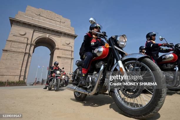 Indian Border Security Force personnel from women's motorcycle team 'Sema Bhawani' ride their Royal Enfield motorcycles during the BSF Seema Bhawani...