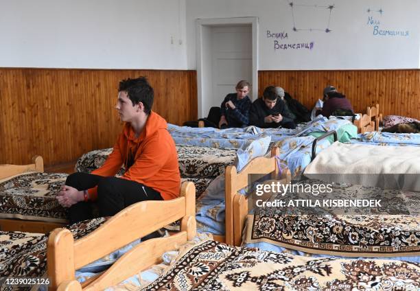 Youngsters stay in a dormitory in a school in Perekhrestya, close to the Ukrainian-Hungarian border on March 7 a refuge for 93 orphaned children...
