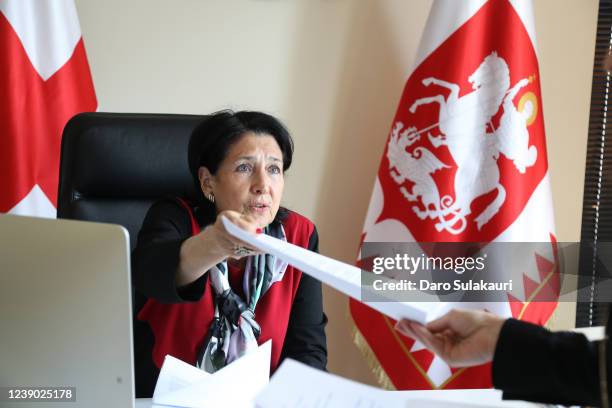 President Of Georgia, Salome Zourabichvili, at work with a team member in her office on March 8, 2022 in Tbilisi, Georgia. Zourabichvili who serves...
