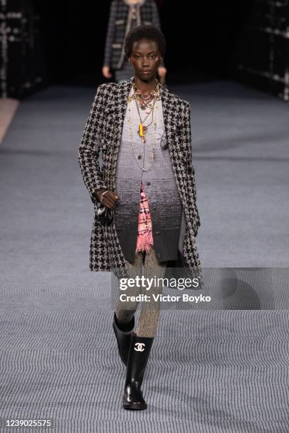 Model walks the runway during the Chanel Womenswear Fall/Winter 2022-2023 show as part of Paris Fashion Week on March 8, 2022 in Paris, France.