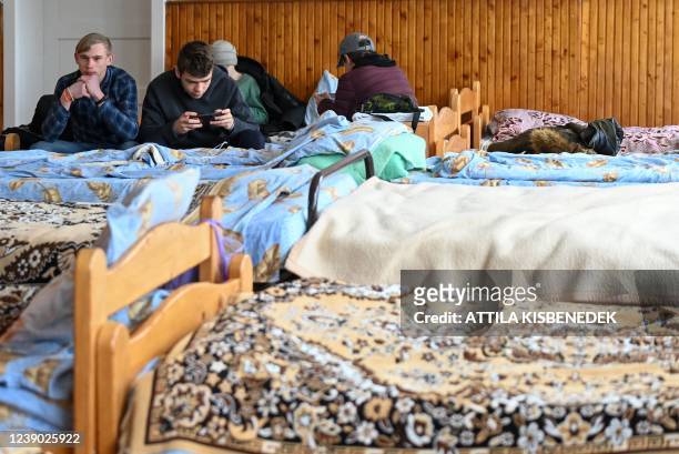 Boys play in a dormitory in a school in Perekhrestya, close to the Ukrainian-Hungarian border on March 7 a refuge for 93 orphaned children evacuated...