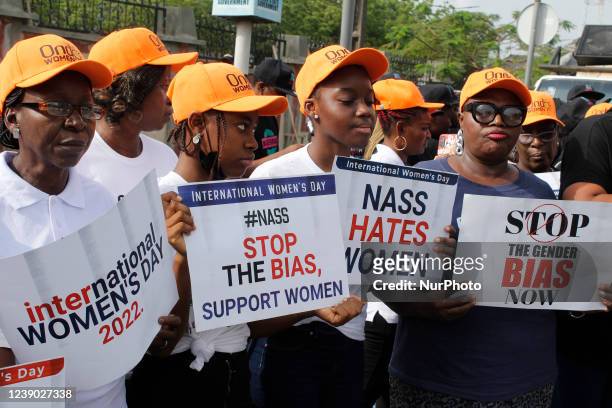 Women from different Non-Governmental Organisations hold a protest rally to mark the International Women's Day 2022 at Alausa, Ikeja, Lagos, Nigeria...