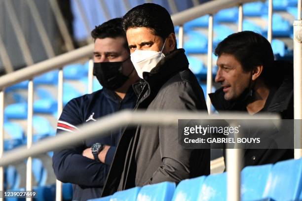 Paris Saint-Germain's Argentinian head coach Mauricio Pochettino , Paris Saint-Germain's Qatari president Nasser Al-Khelaifi and Paris...