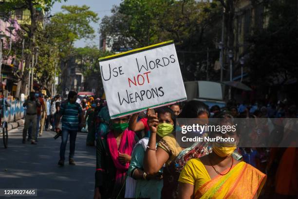 Students and citizens from various colleges joined feet in a peaceful rally to demand equal rights for woman and for peace for woman's around the...