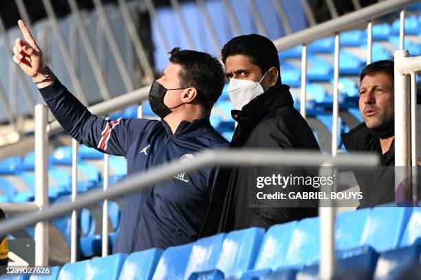 Paris Saint-Germain's Argentinian head coach Mauricio Pochettino , Paris Saint-Germain's Qatari president Nasser Al-Khelaifi and Paris...