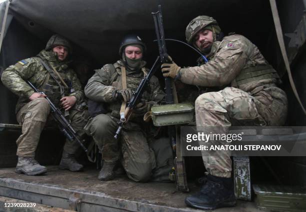 Servicemen of Ukrainian Military Forces move to their position prior to the battle with Russian troops and Russia-backed separatists in Luhanskregion...