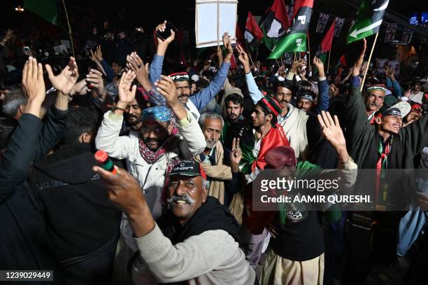 Supporters of opposition Pakistan Peoples Party gather around a truck carrying Chairman of PPP Bilawal Bhutto Zardari, leading an anti-government...