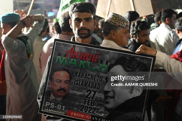 Supporters of opposition Pakistan Peoples Party gather around a truck carrying Chairman of PPP Bilawal Bhutto Zardari, leading an anti-government...