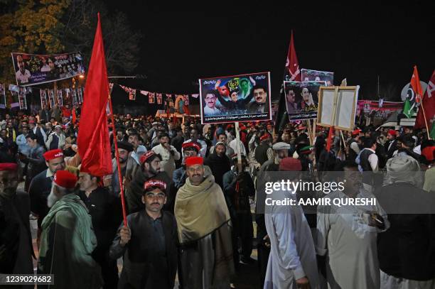 Supporters of opposition Pakistan Peoples Party gather around a truck carrying Chairman of PPP Bilawal Bhutto Zardari, leading an anti-government...