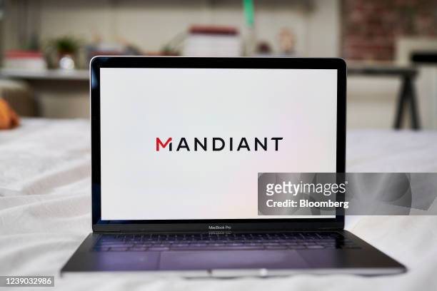 The Mandiant logo on a laptop computer arranged in the Brooklyn borough of New York, U.S., on Tuesday, March 8, 2022. Google agreed to acquire...