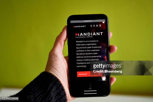 The Mandiant website on a smartphone arranged in the Brooklyn borough of New York, U.S., on Tuesday, March 8, 2022. Google agreed to acquire...