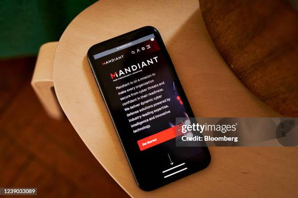 The Mandiant website on a smartphone arranged in the Brooklyn borough of New York, U.S., on Tuesday, March 8, 2022. Google agreed to acquire...