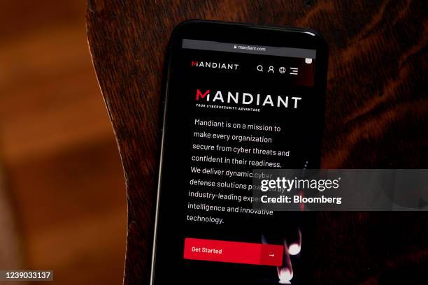 The Mandiant website on a smartphone arranged in the Brooklyn borough of New York, U.S., on Tuesday, March 8, 2022. Google agreed to acquire...