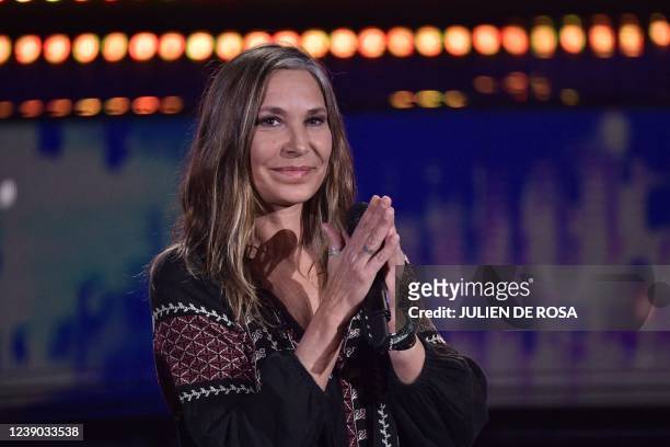 French singer Zazie acklowledges the audience on March 8 during the "United for Ukraine" TV live event to support the Ukrainian people and all the...