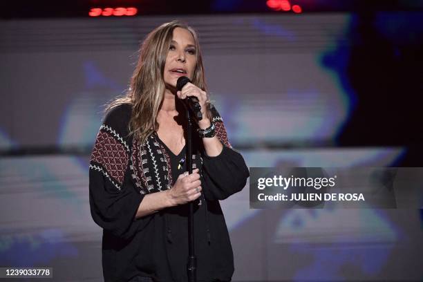 French singer Zazie performs on March 8 during the "United for Ukraine" TV live event to support the Ukrainian people and all the populations...
