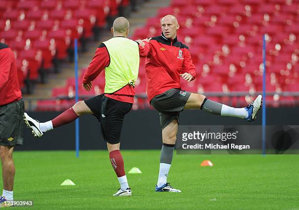 James Collins warms up during the Wales training session ahead of their UEFA EURO 2012 Group G qualifier against England at Wembley Stadium on...