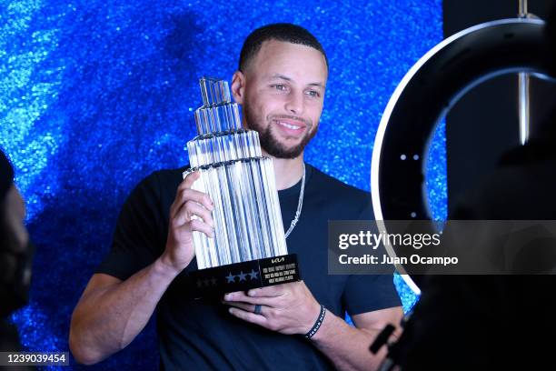 Stephen Curry of the Golden State Warriors poses for a portrait with the Kia NBA All-Star MVP Kobe Bryant Trophy after 71st NBA All-Star Game as part...