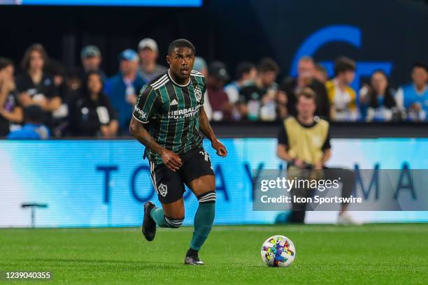 Douglas Costa of Los Angeles Galaxy brings the ball down the field during a soccer match between the Charlotte FC and the Los Angeles Galaxy on March...