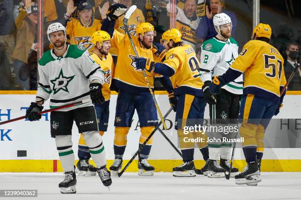 Ryan Johansen and Matt Duchene of the Nashville Predators react after scoring the game tying goal against the Dallas Stars during the third period at...