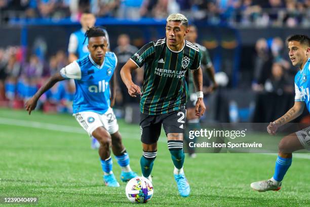 Julian Araujo of Los Angeles Galaxy brings the ball down the field during a soccer match between the Charlotte FC and the Los Angeles Galaxy on March...