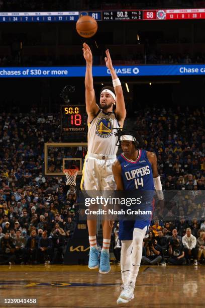 Klay Thompson of the Golden State Warriors shoots a three point basket during the game against the LA Clippers on March 8, 2022 at Chase Center in...