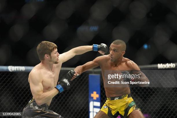 Bryce Mitchell punches Edson Barboza in their Featherweight bout for UFC 272 on March 5 at T-Mobile Arena in Las Vegas, NV.