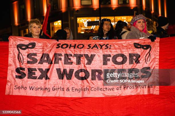 Activists hold a banner during the Sex / Work Strike on International Women's Day in Central London. On International Women's Day, sex workers held a...
