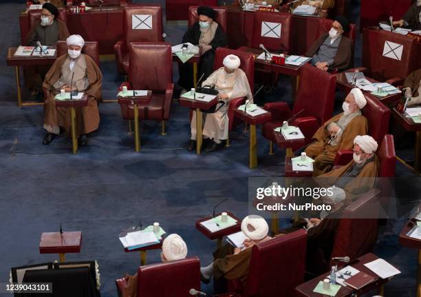 Iranian clerics attend Irans Assembly of Experts biannual meeting in the old Iranian Parliament building in Tehran on March 8, 2022.