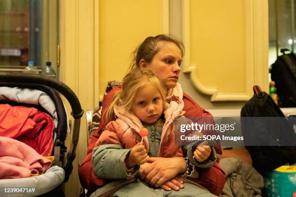 Mother carries her daughter at Przemyl Railway Station. Millions of Ukrainians have been fled from their homeland under ongoing war crisis in Ukraine...