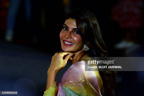 Bollywood actress Jacqueline Fernandez poses for pictures during the promotion of her upcoming Hindi film 'Bachchhan Paandey' in Mumbai on March 9,...