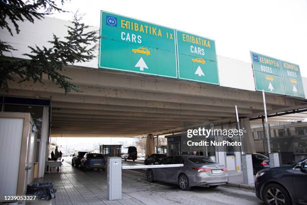 Cars with Ukrainian number plates at the Greek borders. Civilians from Ukraine arrive at Promahonas border crossing in Greece. Ukrainian refugees...