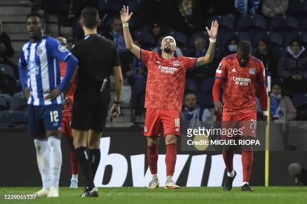 Lyon's Brazilian midfielder Lucas Paqueta celebrates scoring the opening goal during the UEFA Europa League round of 16 first league football match...