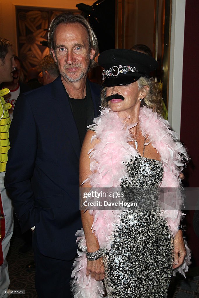 Angel Rutherford Relation Mike Rutherford and his wife Angie Rutherford attend the Freddie For ...