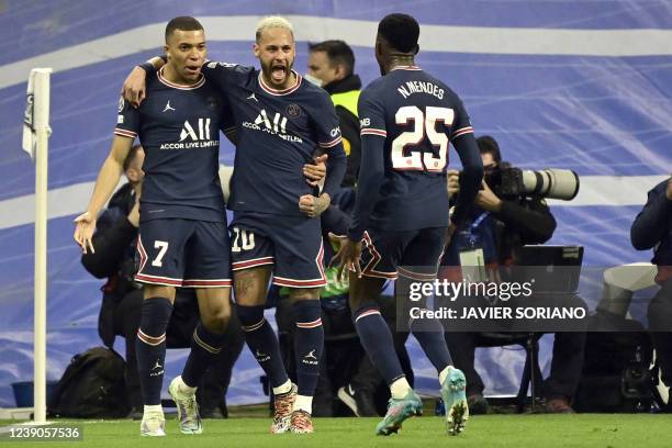 Paris Saint-Germain's French forward Kylian Mbappe celebrates with Paris Saint-Germain's Brazilian forward Neymar after scoring his team's first goal...