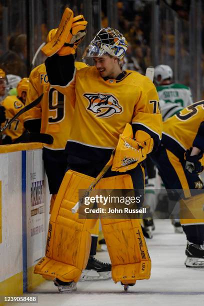 Juuse Saros of the Nashville Predators skates to the bench during a time out against the Dallas Stars at Bridgestone Arena on March 08, 2022 in...