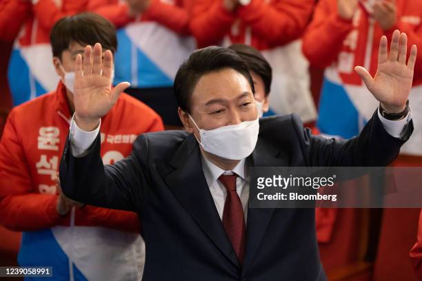 Yoon Suk-yeol, South Korea's president-elect, celebrates at his campaign office in the National Assembly in Seoul, South Korea, on Wednesday, March...
