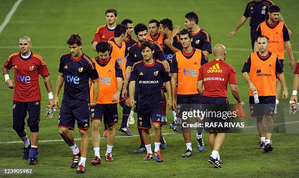 Spain's players leave the filed after a training session on September 5 on the eve of their Euro2012 qualifying football match against Liechtenstein...