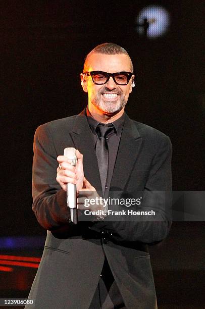 British singer George Michael performs live during a concert at the O2 World on September 5, 2011 in Berlin, Germany. The concert is part of the 2011...