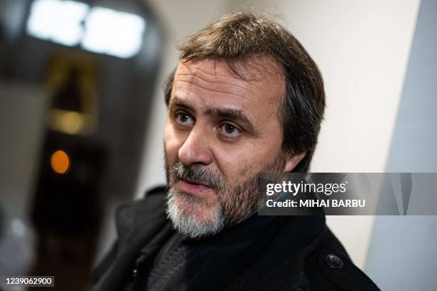 Christian Orthodox priest Georgian Paunoiu is pictured inside his church in Bucharest on March 6, 2022. - "Prayers but above all good works": rolling...