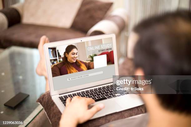 e-learning class on laptop at home - participant advice stock pictures, royalty-free photos & images