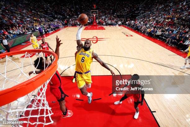 LeBron James of the Los Angeles Lakers dunks the ball during the game against the Houston Rockets on March 9, 2022 at United Center in Chicago,...
