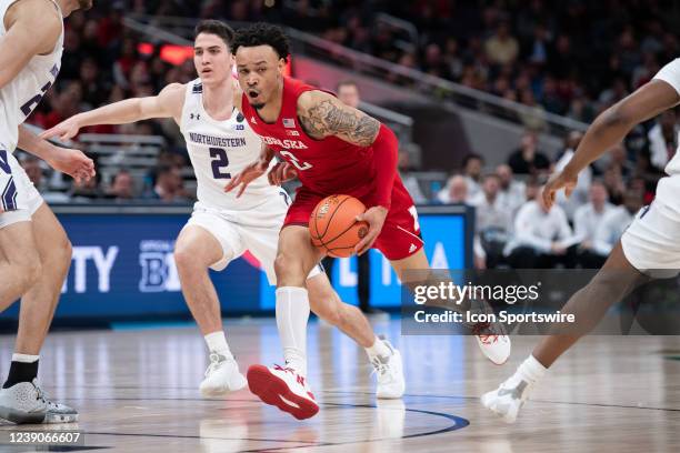 Nebraska Cornhuskers guard Trey McGowens drives past Northwestern Wildcats guard Ryan Greer during the mens Big Ten tournament college basketball...