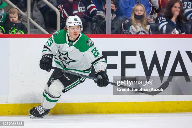 Joel Kiviranta of the Dallas Stars keeps an eye on the play during second period action against the Winnipeg Jets at Canada Life Centre on March 04,...