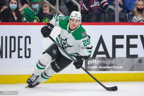 Joel Kiviranta of the Dallas Stars keeps an eye on the play during second period action against the Winnipeg Jets at Canada Life Centre on March 04,...