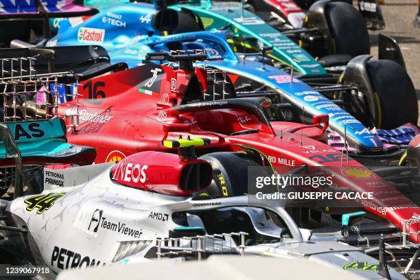 The vehicles are pictured on the starting grid during the first day of Formula One pre-season testing at the Bahrain International Circuit in the...