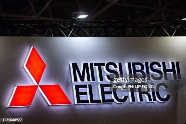 The logo of Mitsubishi electric is pictured at the International Robot Exhibition in Tokyo on March 10, 2022.