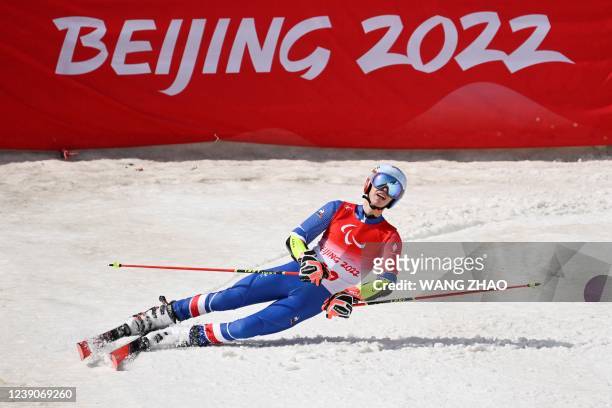 France's Arthur Bauchet reacts after competing in the men's giant slalom standing event at the Yanqing National Alpine Skiing Centre in Yanqing...