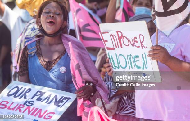 Small group of women gathered at the Women's Climate Strike at the Parliament on International Women's Day on March 08, 2022 in Cape Town, South...