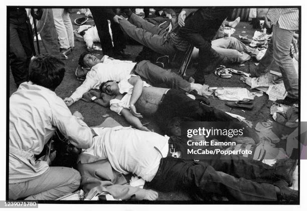 Scenes after many Juventus fans were crushed at the Heysel Stadium before the start of the UEFA European Cup Final between Juventus and Liverpool on...