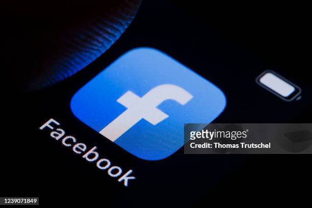 In this photo illustration the logo of facebook can be seen on a smartphone on March 10, 2022 in Berlin, Germany.